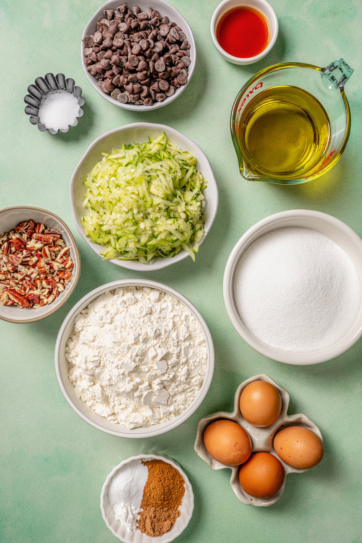 Labeled ingredients for making zucchini bread. 